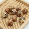 Macro view of faceted natural semi-precious stone pendants with gold-plated loops - 8x13mm / Picture Jasper Style (19)
