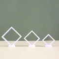 Set of three white PE film floating frames for transparent jewelry display storage - 9x9x2cm / White
