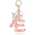 Pink initial E resin keychain featuring heart sequins, butterfly charm, and tassel - Letter E