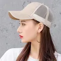 Breathable beige mesh baseball cap for summer sun protection shown on a female model - Khaki