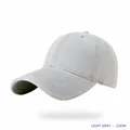 Minimalist light gray baseball cap featuring a wide brim and premium washed fabric finish - Light Gray