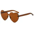 Rimless heart-shaped jelly color sunglasses for women in transparent brown finish. - Brown