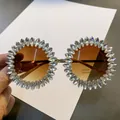 Oversized round sunglasses embellished with marquise-cut crystals for party wear. - White (Brown Lens/Silver Base)