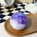 Detailed macro view of handmade purple and white ice cube pattern slow rebound stress relief toy - Grape Shaved Ice Squishy / Purple