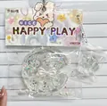 Vue détaillée du jouet anti-stress patte de chat transparent avec paillettes - Grand gâteau transparent plus petite patte de chat
