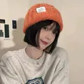 Stylish orange knit beanie for men and women, winter warm slouchy skull cap - One Size / Twisted Chain / Orange