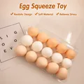 Set of 15 realistic egg squishy stress relief toys in a transparent carton - Realistic Egg (Single Piece)