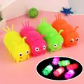 Bright colorful glowing caterpillar puffer ball toy with internal flashing LED lights - Light-Up Puffer Caterpillar