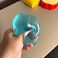 Blue translucent maltose squishy stress relief toy for sensory play and relaxation. - Round Shape / 6cm (PVC Bag) / Blue