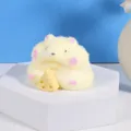 Cute yellow fuzzy hamster squishy toy holding cheese for sensory stress relief fun - Yellow Flocked