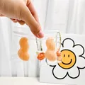 Χαριτωμένο παιχνίδι squishy σε σχήμα φιστικιού με κουδούνι σε διαφανή συσκευασία. - Μενταγιόν Squishy Σχήμα Φυστικιού Με Κουδούνι