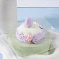 Cute slow-rising silicone puff cake squishy toy with purple strawberry and pig charm. - Strawberry Puff Cake / Purple