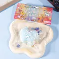 Juguete squishy azul con forma de mariposa en un colorido empaque estilo píxel - Azul