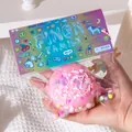 Giocattolo antistress burger rosa con glitter decorativi in confezione colorata 'Pinch Family' - Burger Rosa