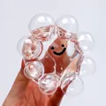 Transparent crystal bubble squishy toy with a cute black smiley face for stress relief - Crystal Squishy Ball (With Tool) / 2 Pcs/Set