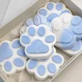 Close-up detail of blue and white flocked jumbo cat paw squishy toy for tactile stress relief - White and Blue Flocked