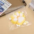 Extra large 14cm flocked cat paw squishy stress relief toy in clear zip bag packaging - Yellow Flocked