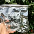 Κοντινό πλάνο ενός γιγάντιου squishy πατούσα γάτας 14cm με γκλίτερ και πεταλούδα - Τυχαία Αλυσίδα / 12cm Transparent Large Cat Paw