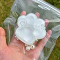 White moonlight cat paw squishy toy with pearl decorations made of soft and durable TPR material - White Moonlight Cat Paw