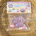 Detailed view of purple glitter cat paw squishy decompression toy in cute packaging - Clear Pink Cat Paw