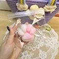 Λεπτομερής προβολή ροζ και λευκού squishy παιχνιδιού πατούσας γάτας σε διάφανη συσκευασία - 7cm Size / Ροζ-Λευκή Πατούσα