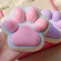 Macro detail view of rainbow cat paw dopamine squishy toy with soft TPR material texture - Rainbow Pink