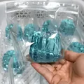 Blue translucent squishy toy in plastic bag for stress relief and sensory play - Canelé Style (Glacier Blue)