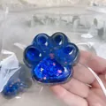 Extra large blue translucent cat paw squishy toy with glitter sequins for stress relief - Aurora Glitter Blue