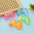 Giocattoli antistress morbidi a forma di controller di gioco colorati con glitter dorati - Forma del Controller della Console / Taglia Grande (8x5x3cm)