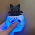 Halloween skull squeeze toy with popping bat and blue LED light stress relief gadget - Glowing Skull Cup