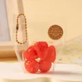 Jouet à presser fraise dans une pochette transparente avec porte-clés doré - Morceaux de fraises, 1 paquet