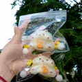 Close-up of cute hamster squeeze toys with cheese accessories in clear zip-lock bags - Simple Pack Without Card Header / Beige