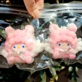 Detailed view of two cute pink and white angel lamb squishy toys in transparent zip bags - Angel Lamb
