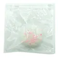 Simulated egg yolk pastry squishy toy in a clear zipper bag for effective stress relief - Daifuku Bun Squishies