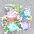 Set di quattro colorati squishy a zampa di gatto floccati in rosa, blu, verde e viola - Squishy zampa di gatto floccata (Base colorata e superficie bianca)