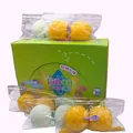Detailed view of colorful Daifuku squeeze toys in individual bags and display box - Fried Meatball Skewer
