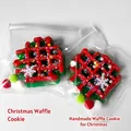 Nahaufnahme von Weihnachts-Waffel-Squishy-Spielzeug in Klarsichtfolie - Weihnachtswaffel Stil
