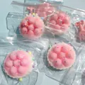 Glitzerndes rosa Himbeertorten-Kuchen-Squishy-Spielzeug in Klarsichtverpackung - Glitzer Erdbeertorte Stil