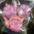 Translucent pink color-changing cat paw squishy toy with glitter in clear packaging - Pink Transparent