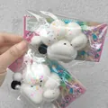 Adorable soft cat paw squishy toy featuring iridescent glitter stars and small pearl accents - White Cat Paw / Translucent White