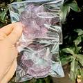 Soft purple glitter cat paw squishy stress relief toy in transparent plastic packaging - 7x7cm / Purple Crystal Rice Ball