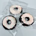 Cute donut slow rebound squishy stress relief toy with pink frosting and glitter - Black & White Powdered Donut Squishies