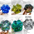 Galaxy themed cat paw squeeze toy in various glitter colors for stress relief - 7cm / Aurora Green