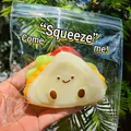 Cute taco-shaped simulation food squishy toy with happy face in clear bag - Layered Sandwich Burger Squishy