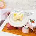 Close-up view of cute slow rebound animal squishy toy inside clear plastic packaging - Yellow Fox Style (JH-1112) / Fox Head
