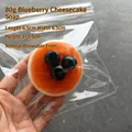 Simulation Souffle Squishy Stress Toy - Caramel Color with Blueberries, 80g Weight, 6.5cm Size - 80g Caramel Soufflé with Three Blueberries