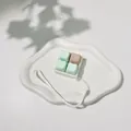 Macro view of 4-key mechanical switch tester with cute cat-ear keycaps - Mint Milk Coffee