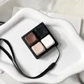 Close-up of a 4-grid mechanical switch fidget keychain in macaron colors. - Macaron (Black Base)