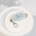 Detail van een 3-toets mechanische switch fidget-sleutelhanger voor focus en ontspanning. - Walvisblauw (Gemengde Schakelaars)