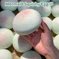 Extra large mint green squishy bun toy with slow rebound for stress relief - Sticky Bun / Pearl White